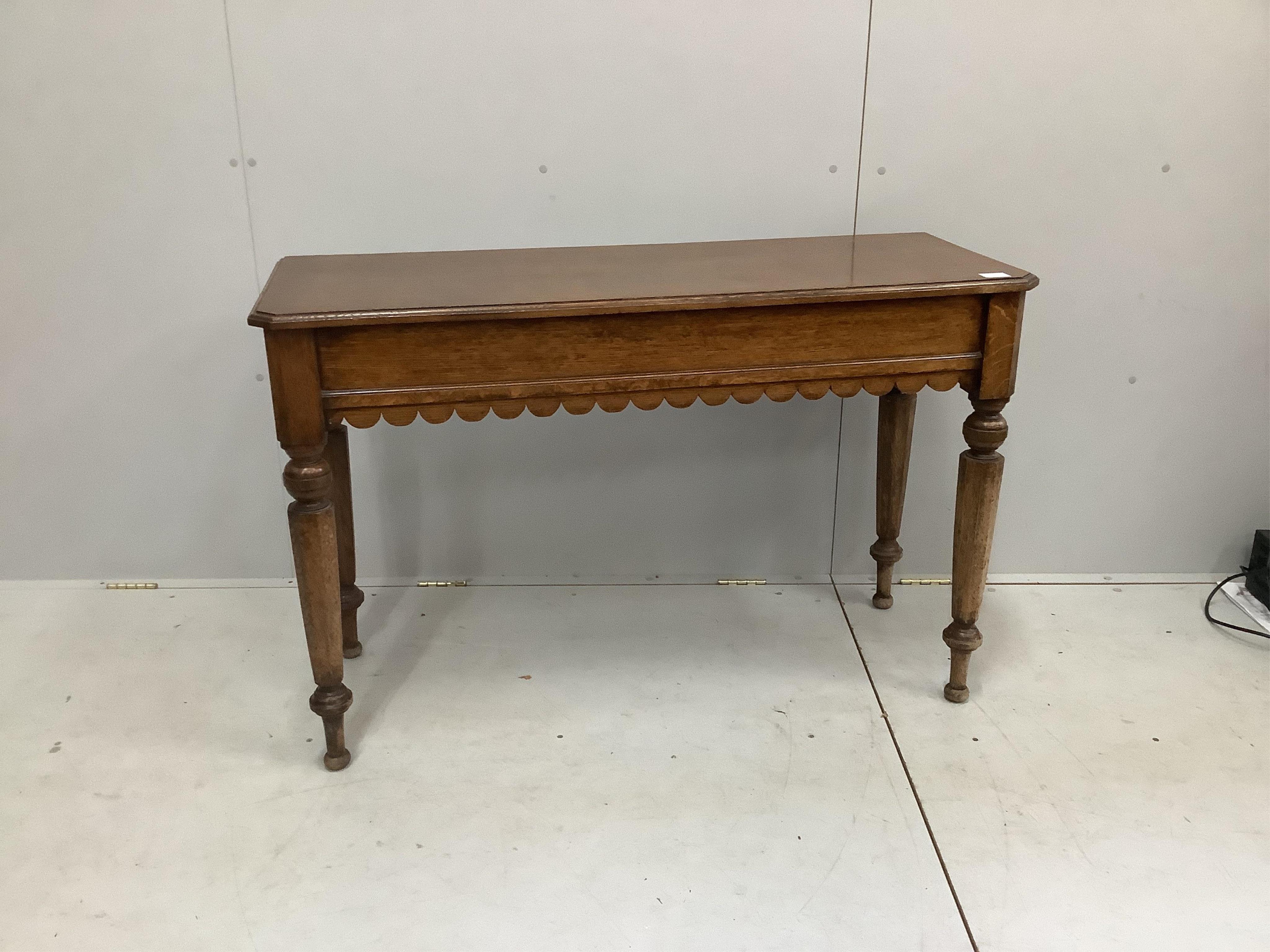 A Victorian oak side table, width 121cm, depth 45cm, height 78cm. Condition - fair